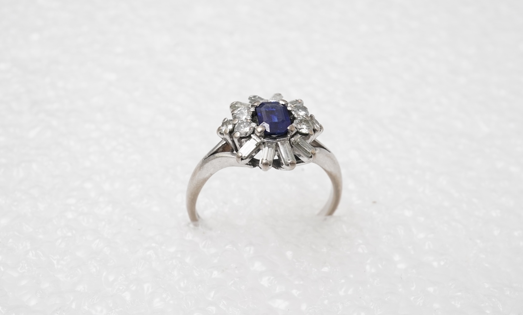 A sapphire and diamond ring, mid 20th century